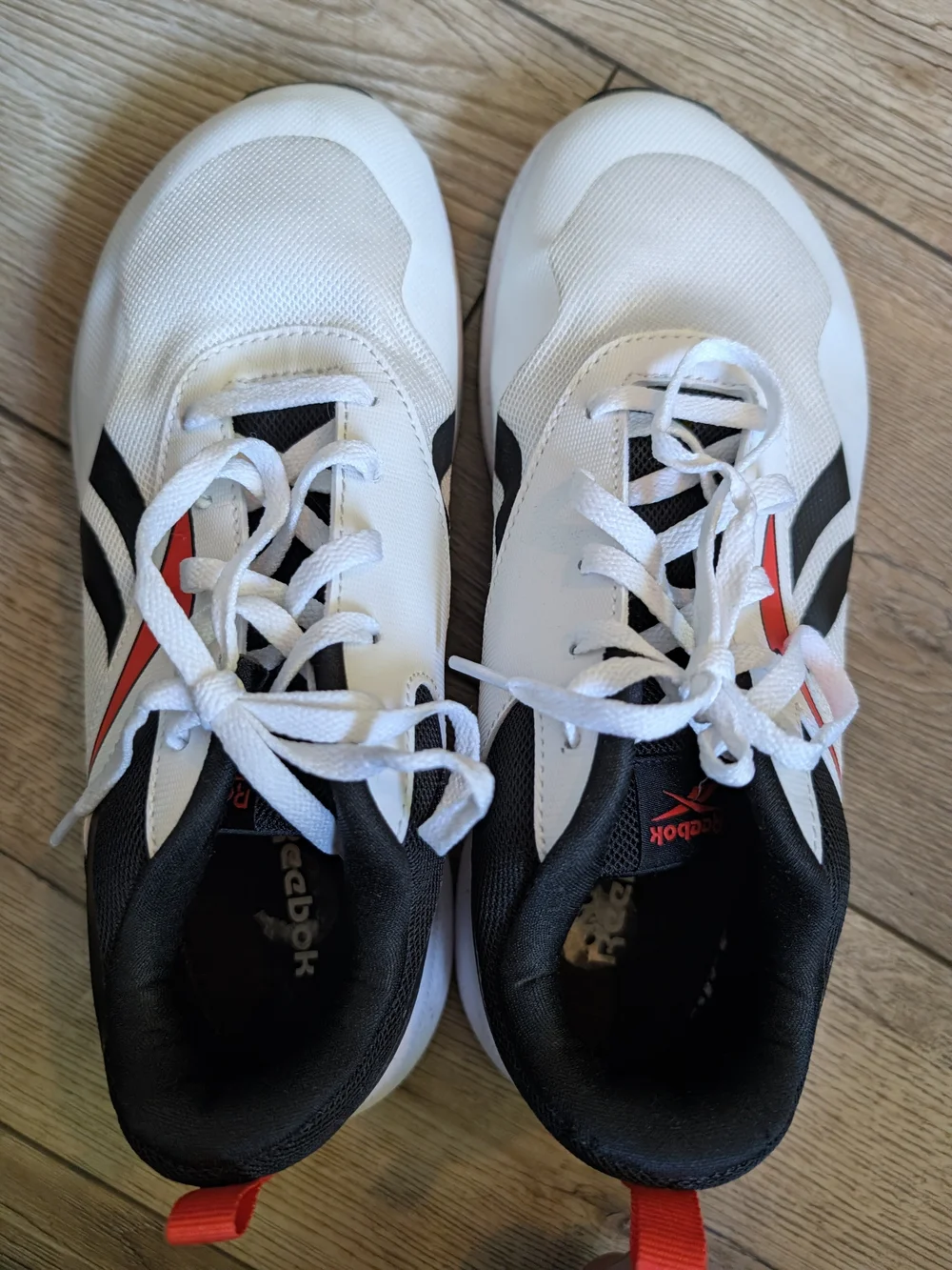 Men's Lace- Up Reebok Nano Sneakers.